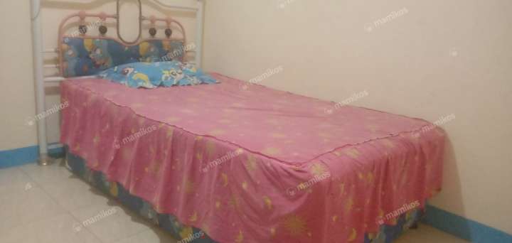 Room with a bed and a desk